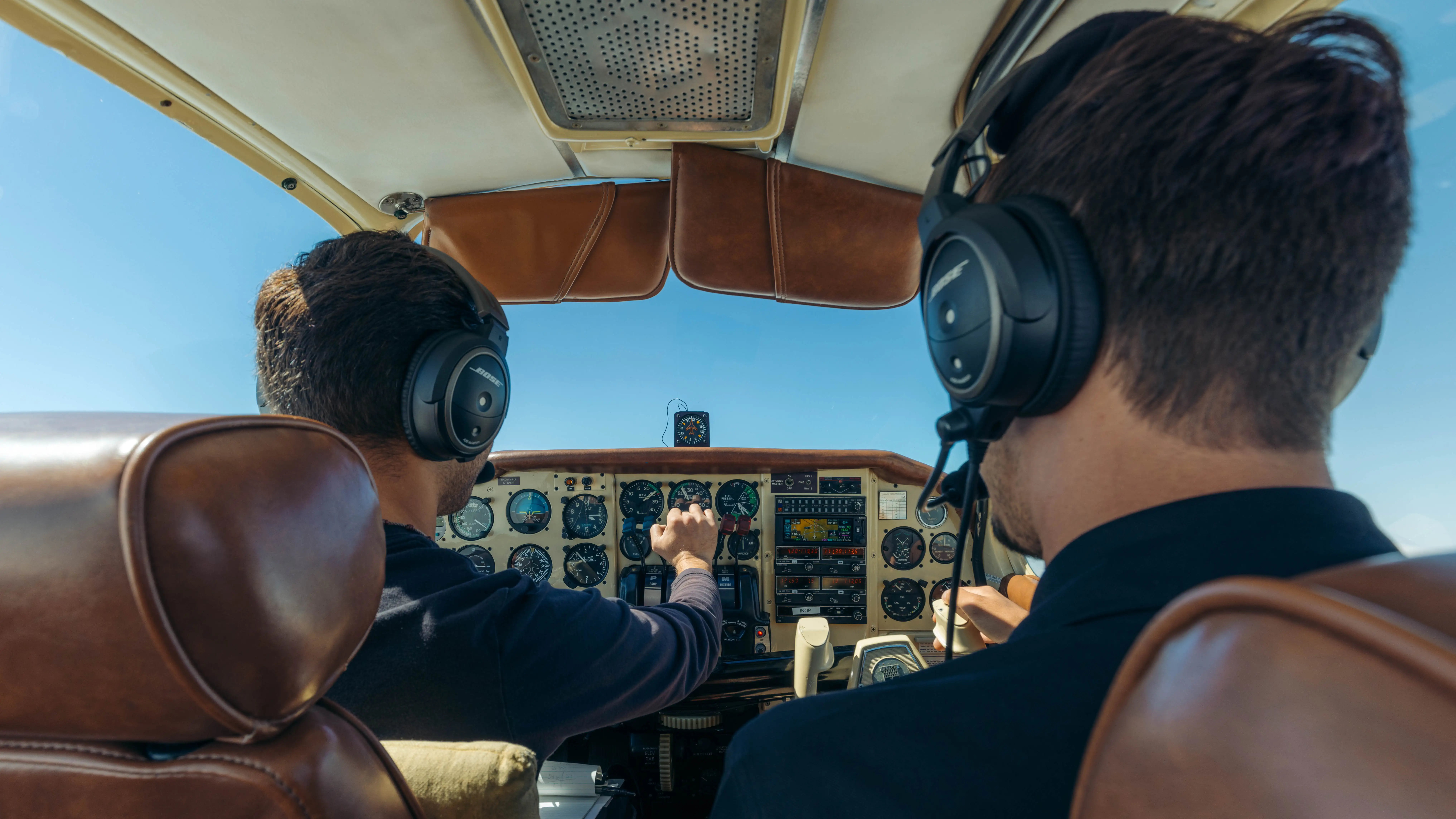 LAFA aircraft in flight, viewed from behind the pilots