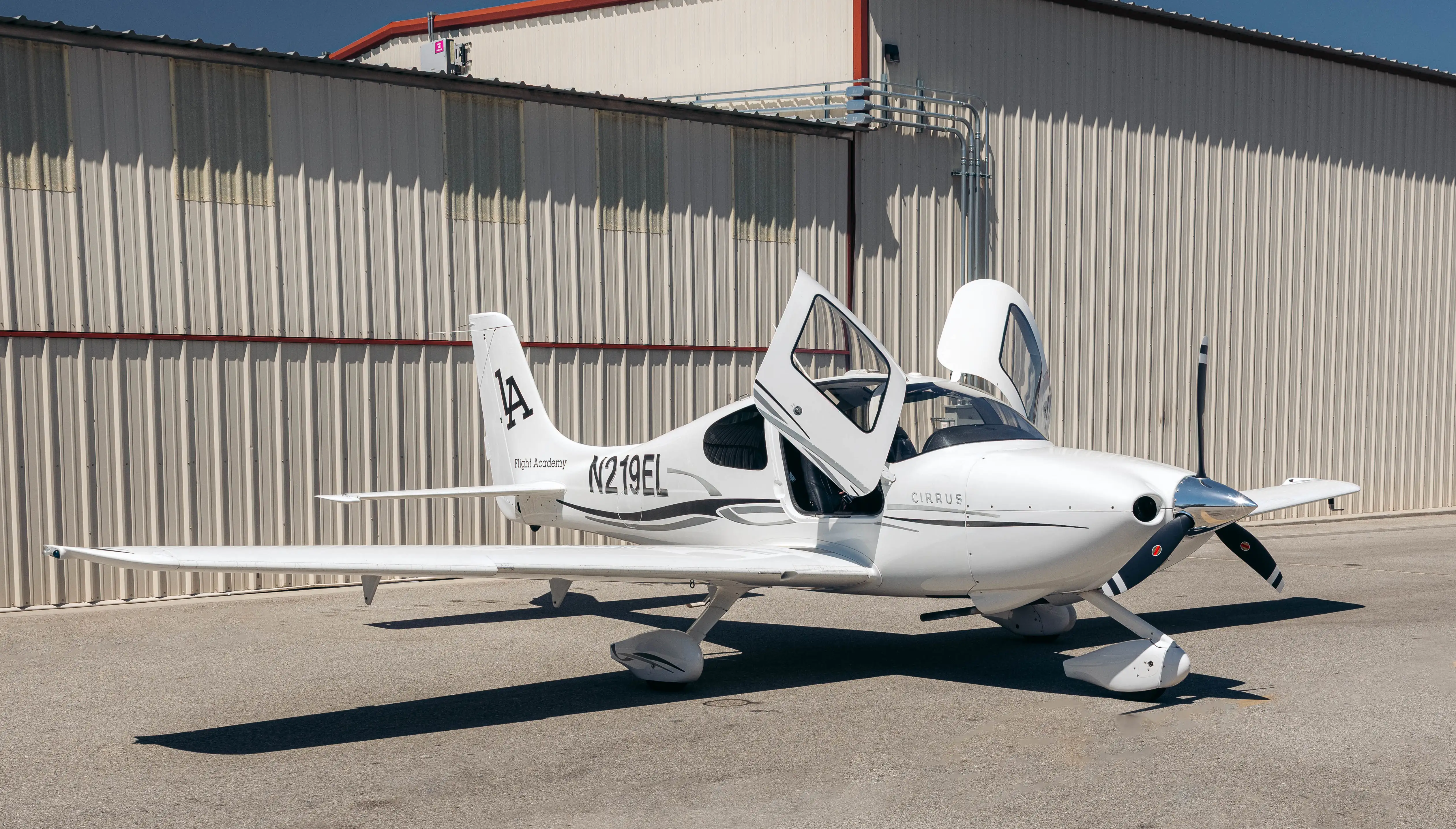 N219EL Cirrus SR20 GTS side view open doors at LA Flight Academy Van Nuys