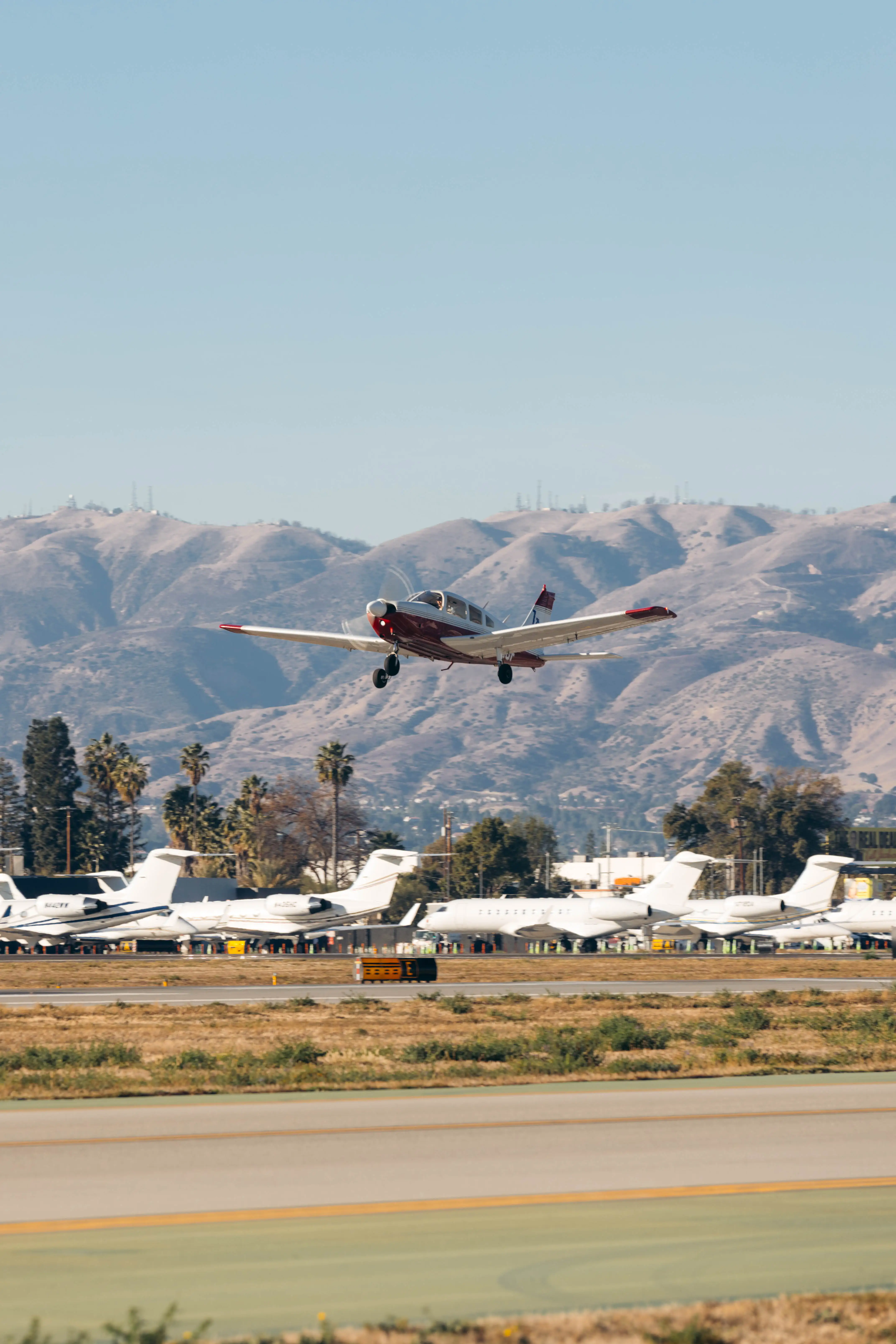 LA flight academy aircraft flying over Los Angeles, California