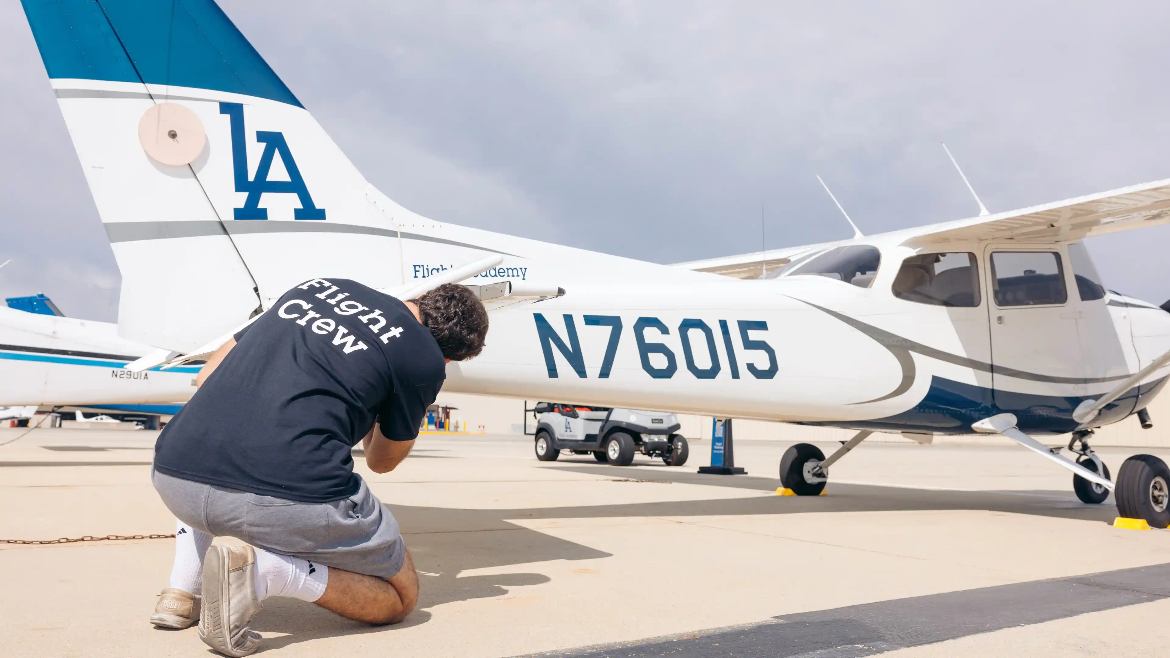 la flight academy los angeles flight school cfi checking rudder and stabilizers of piper archer plane