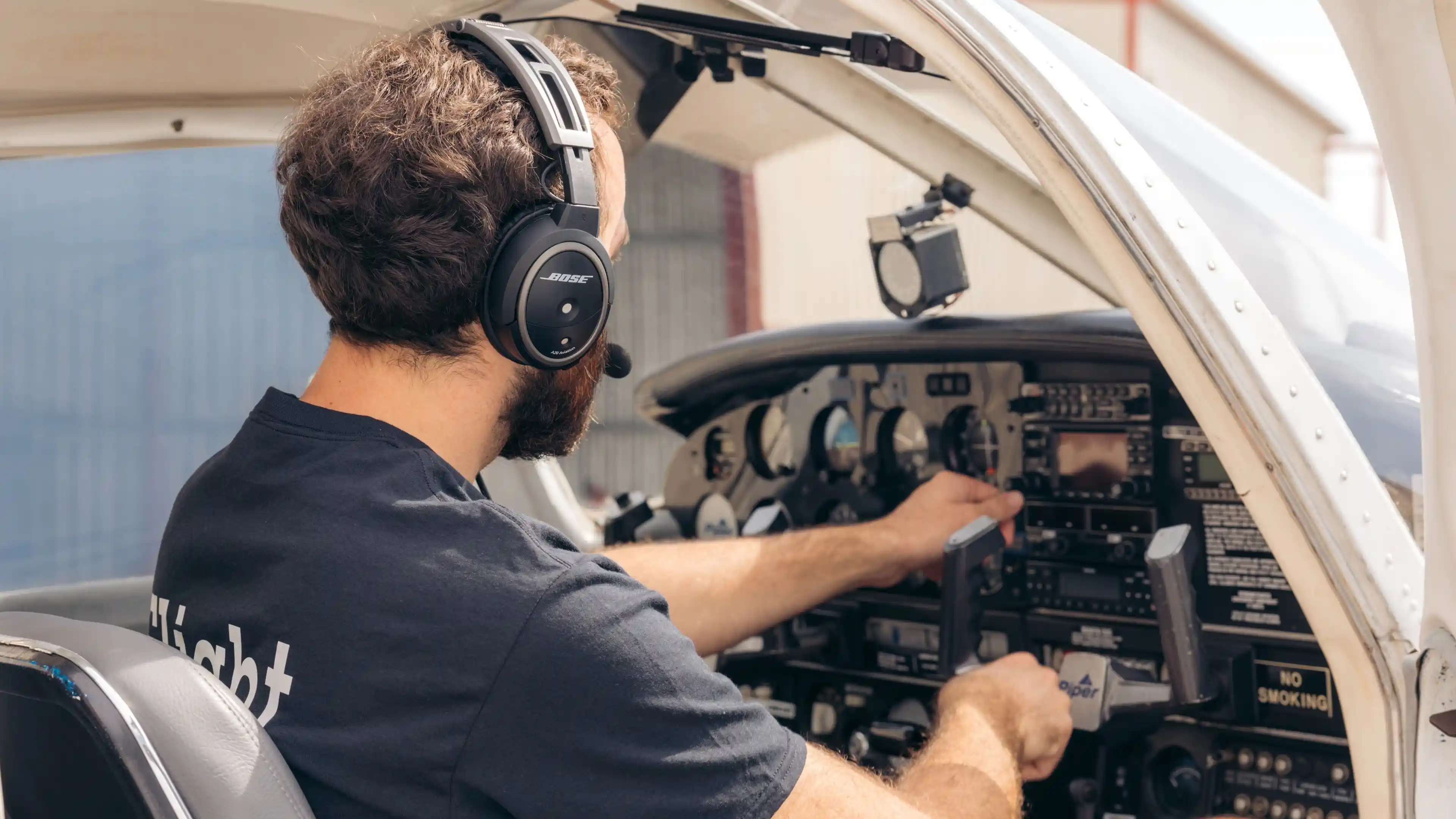 la flight academy los angeles flight school cfi checking controls of piper archer plane