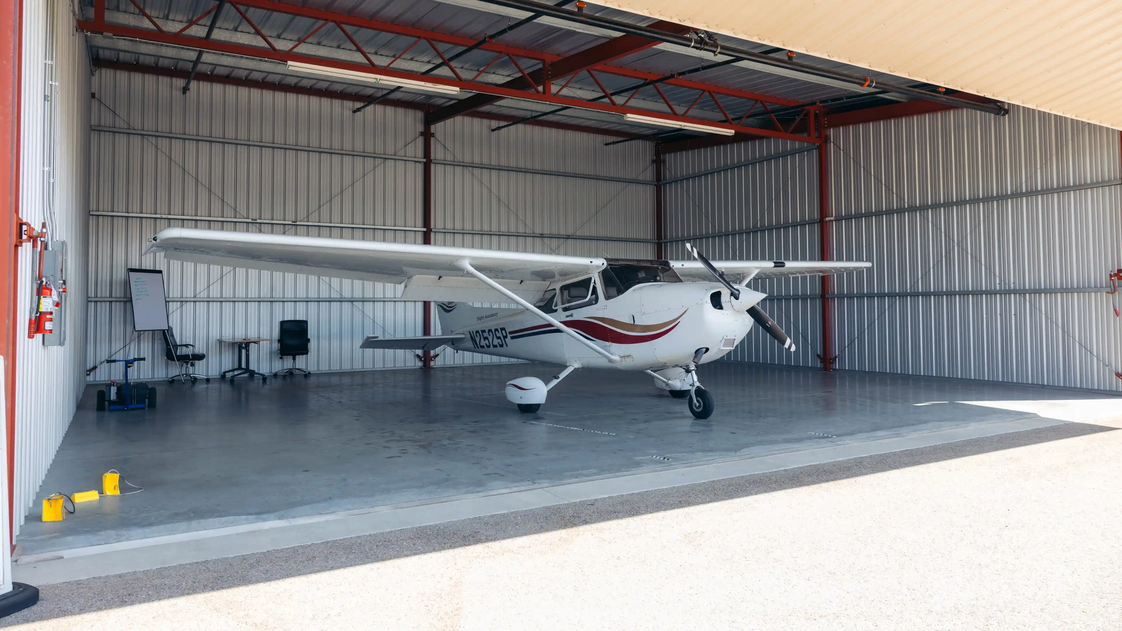 la flight academy los angeles flight school plane cessna 172s inside hangar