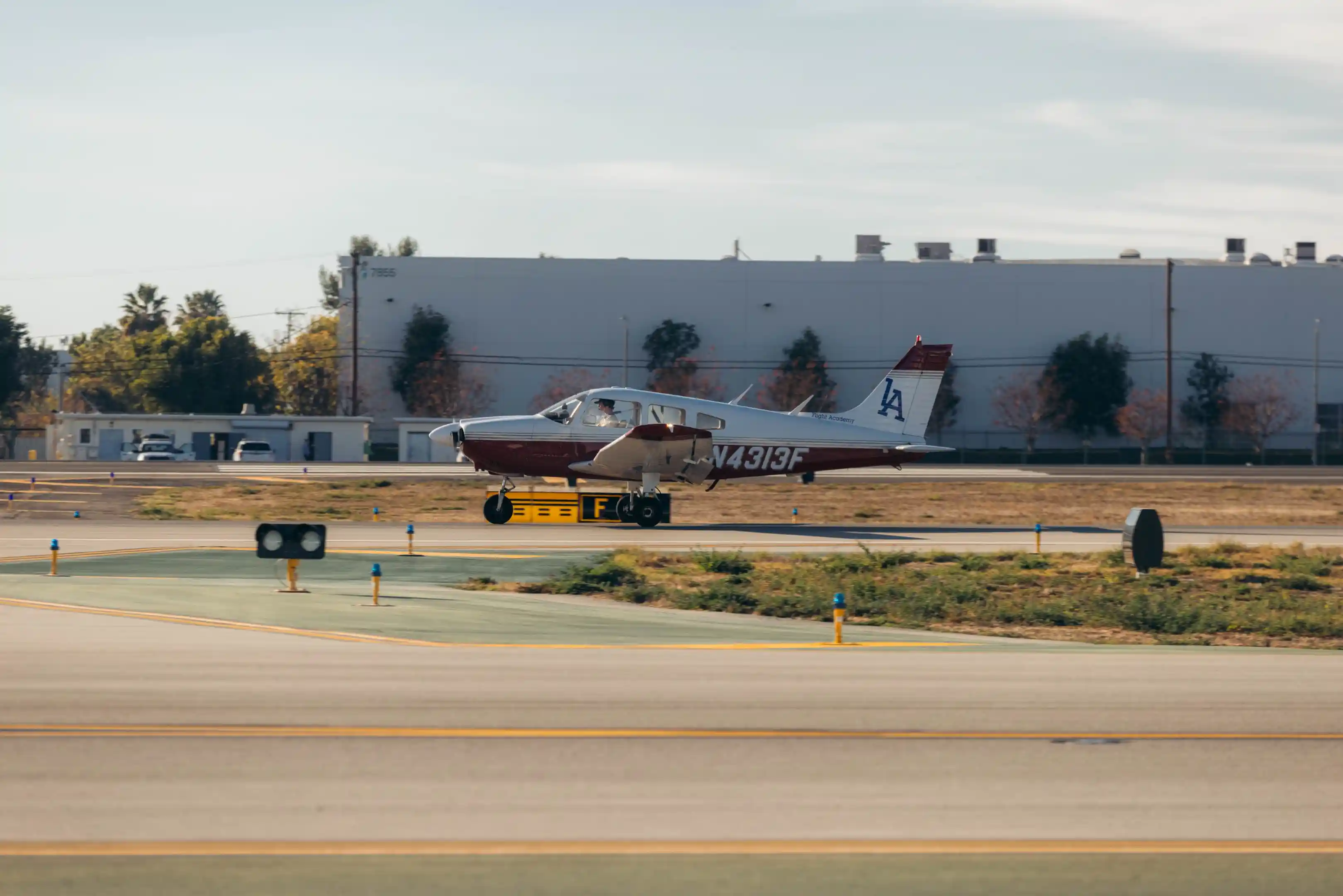 la flight academy los angeles flight school plane piper cherokee on runway