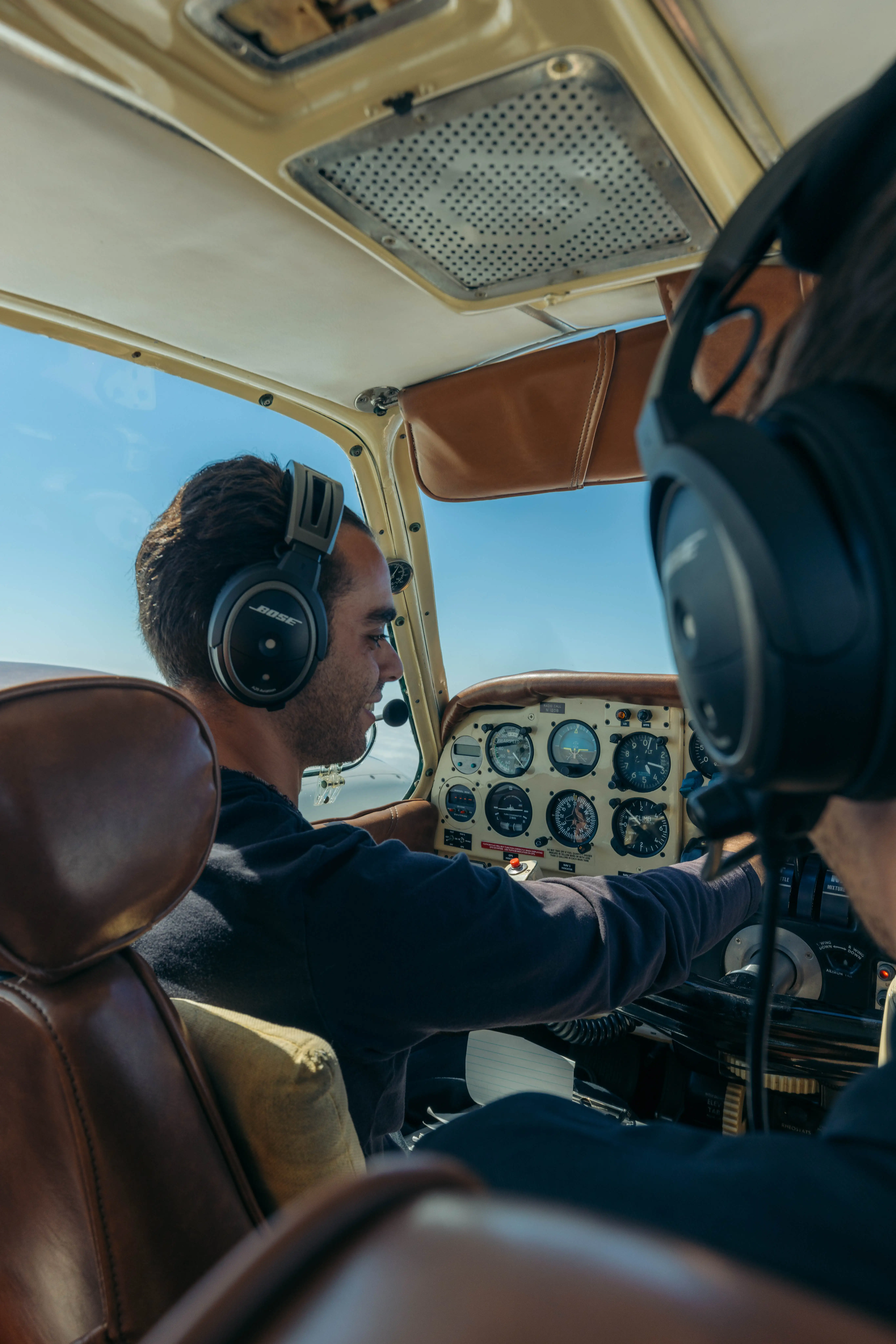 Instructor and student flying a multi-engine aircraft