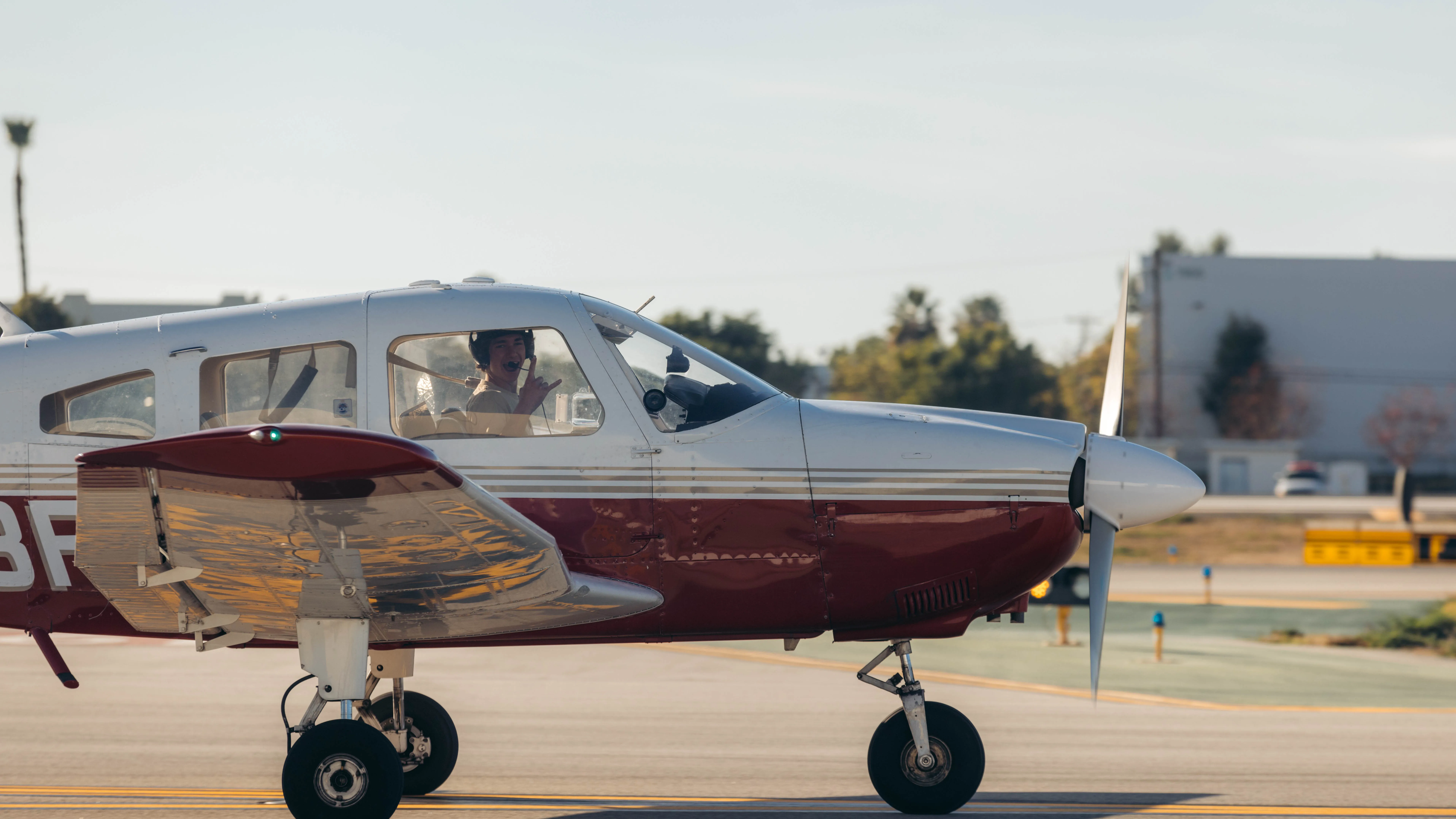 LA Flight Academy student posing for first solo flight