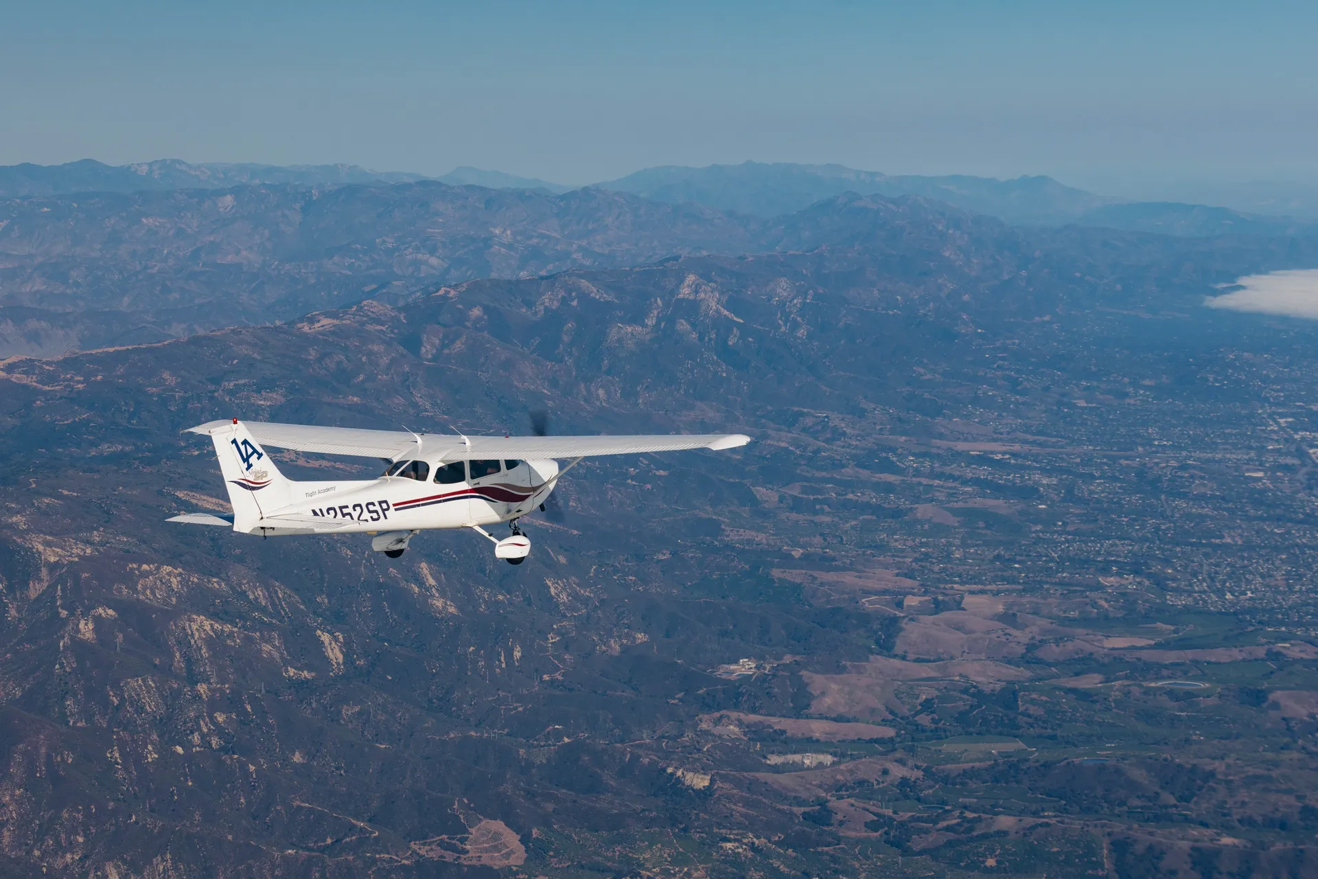 LA Flight Academy aircraft flying over Southern California
