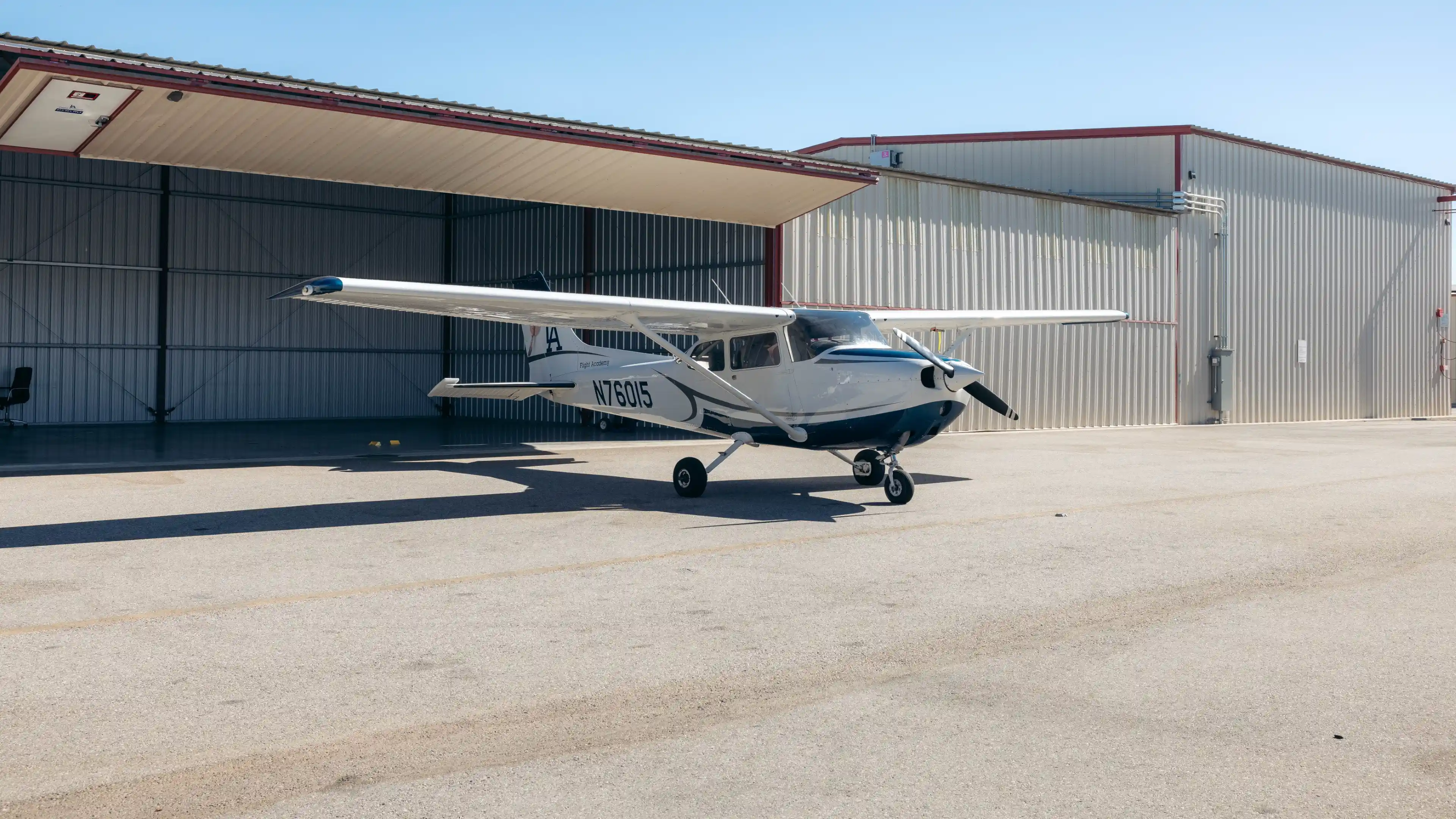 la flight academy los angeles flight school plane cessna 76015 outside hangar
