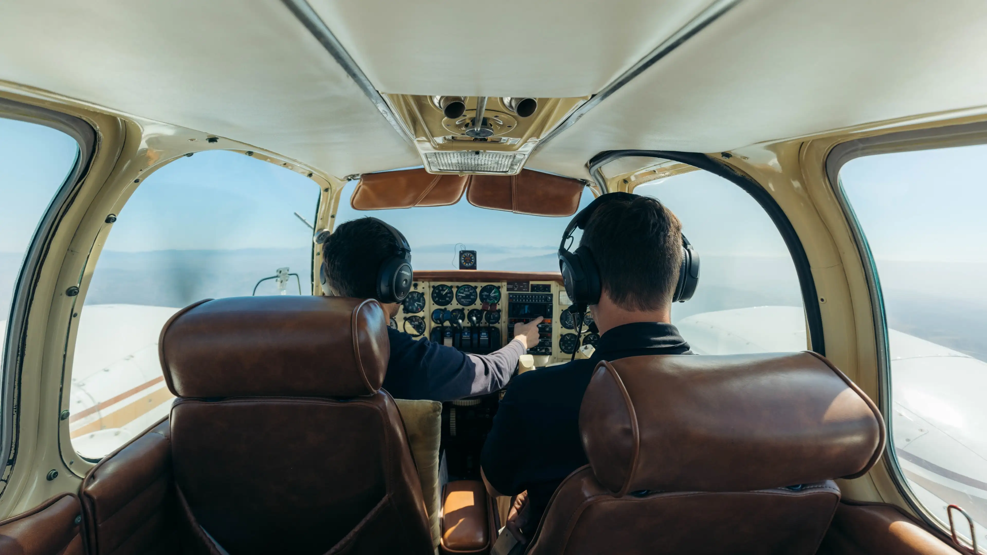 Airline pilot cockpit view, preparing for flight